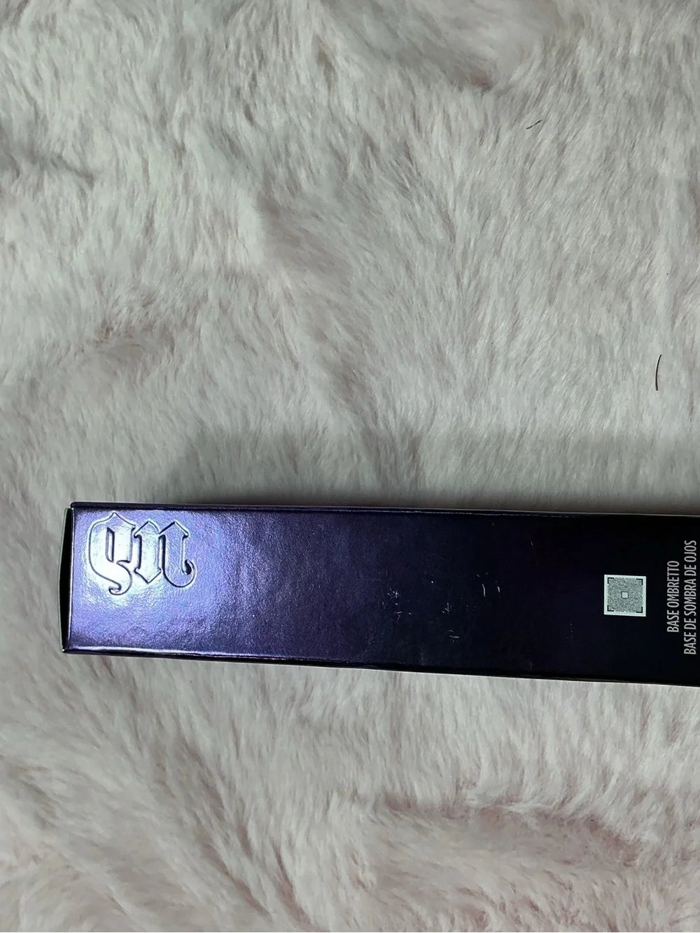Urban Decay Eyeshadow Primer Tube in Purple Metallic Packaging